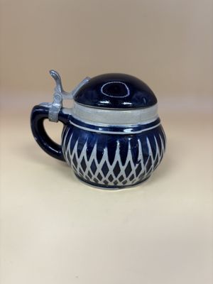 Stein. Germany. Dark Blue Stein Pot w/ Grey Crossed Lines on Bottom. 3"H
