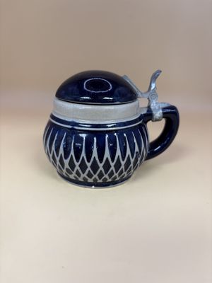 Stein. Germany. Dark Blue Stein Pot w/ Grey Crossed Lines on Bottom. 3"H