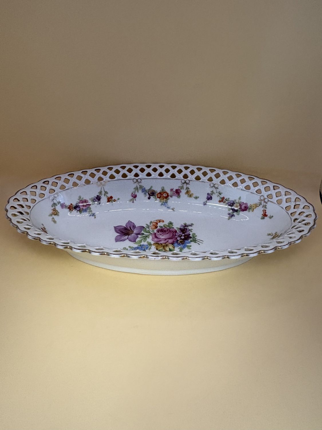 Porcelain. Germany. Schumann. Oval Serving Bowl w/Gold Floral and Bow Details and Scalloped Edge. 11.25&quot;W