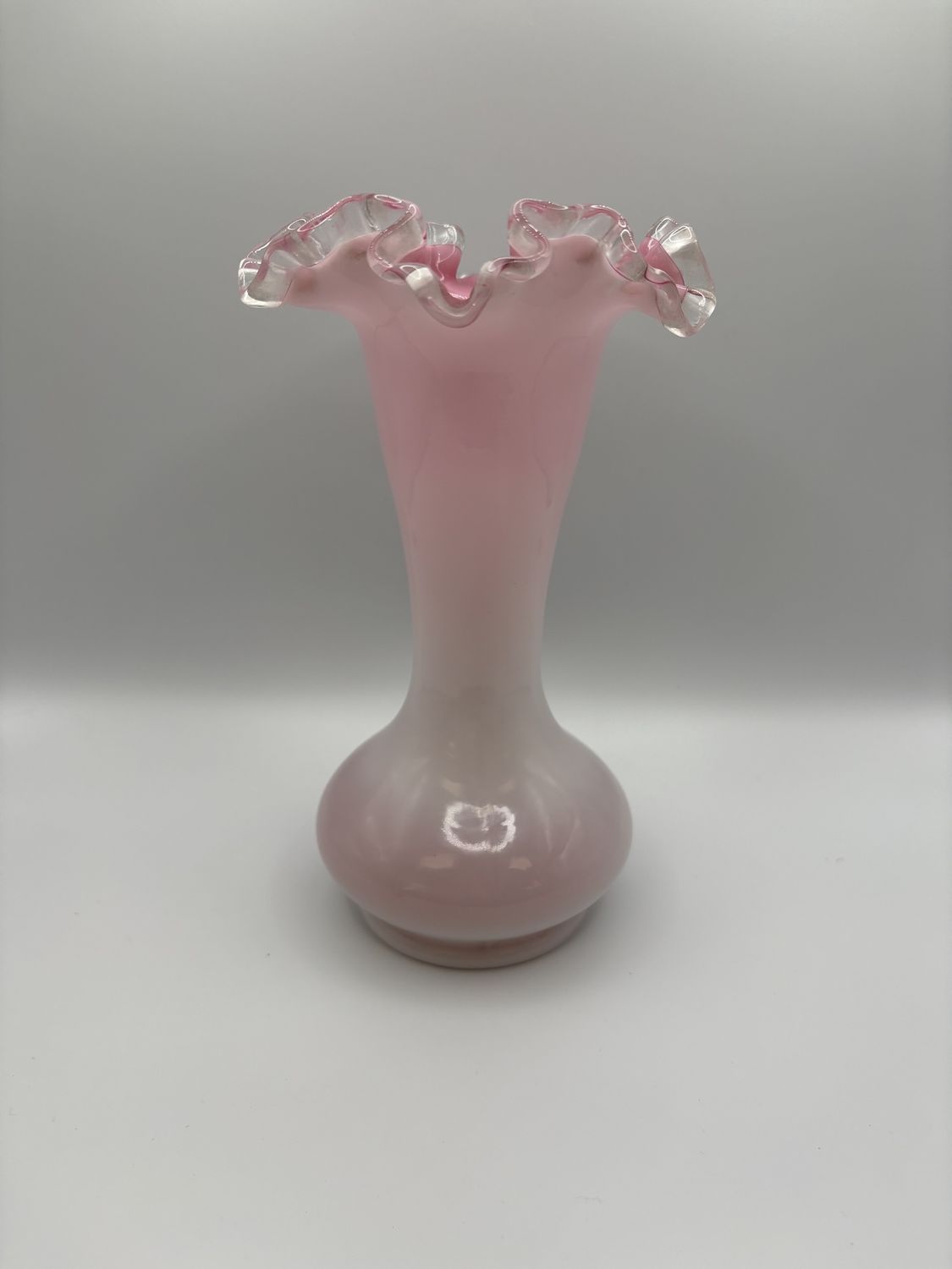Glass. USA. Fenton. White Milk Glass w/Pink Cased Interior. Vase w/Ruffled Edge. 8.5&quot;H
