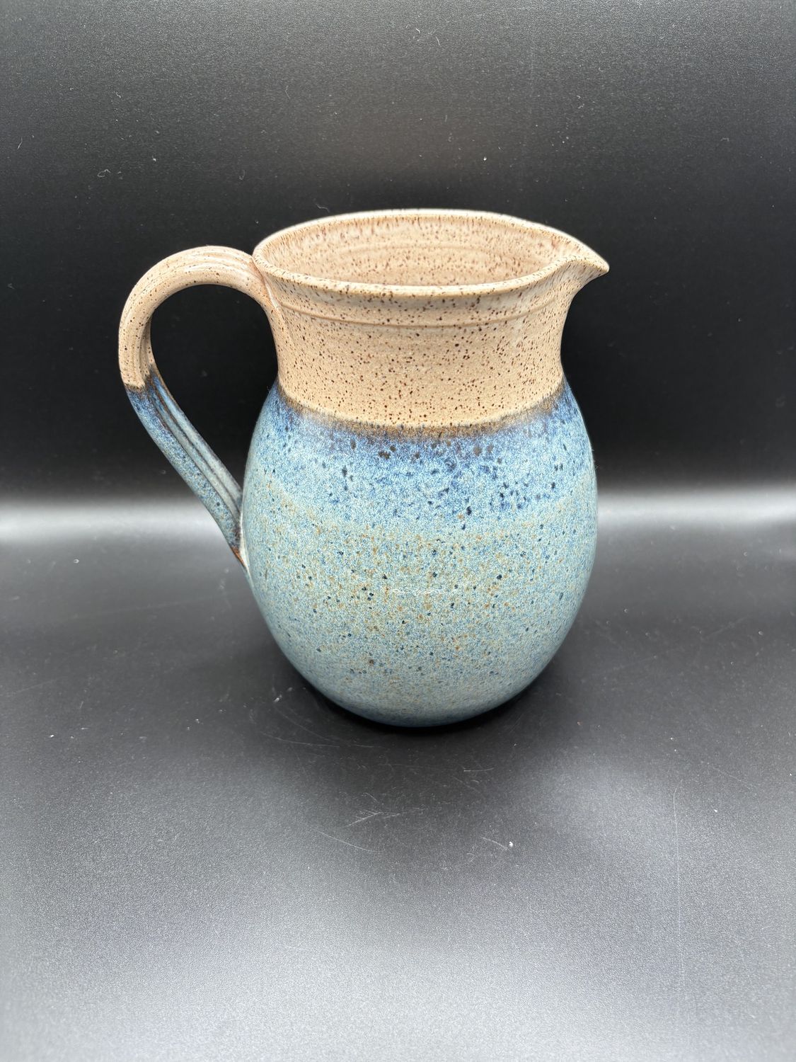 Pottery. USA. Wheeler Ceramics. Pitcher. Blue Base w/Beige Top and Speckles. 7&quot;H