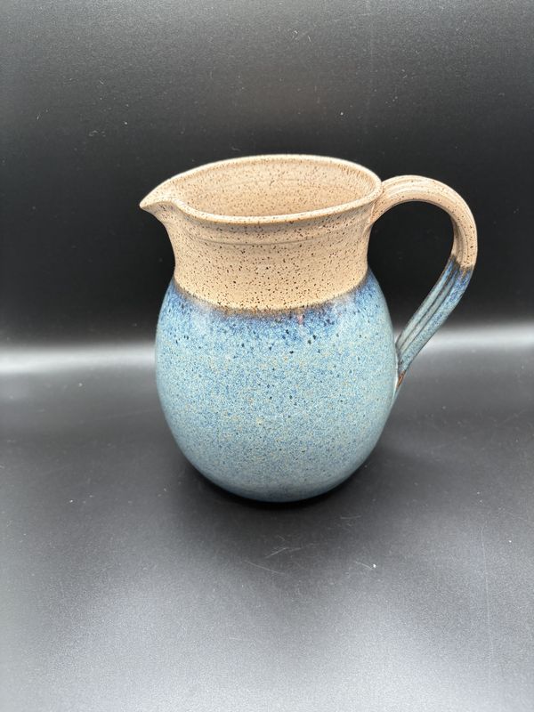Pottery. USA. Wheeler Ceramics. Pitcher. Blue Base w/Beige Top and Speckles. 7"H