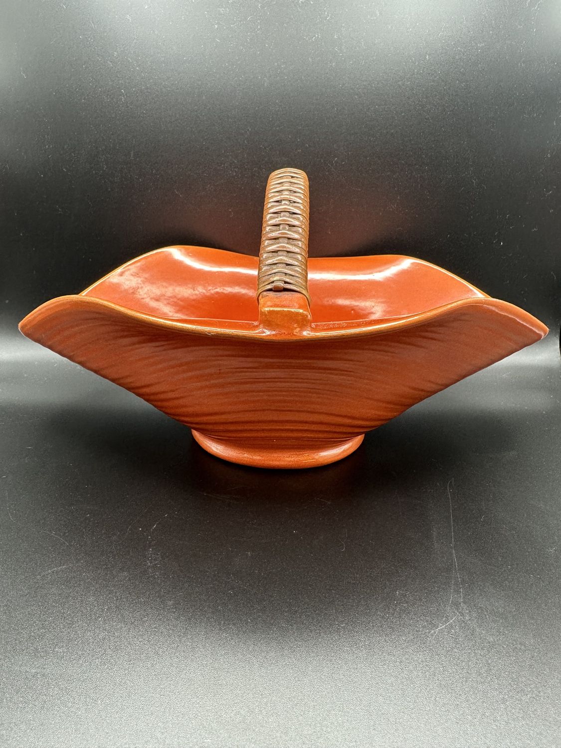 Ceramic. Basket. Orange w/Brown Woven Handle. 9.5&quot;L x 11.5&quot;W