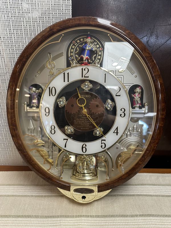 Clock. Seiko. Melodies in Motion Animated Musical Wall Clock w/Swarovski Crystals. Retired. Plays 8 Tunes. 15&quot;W x 17&quot;H