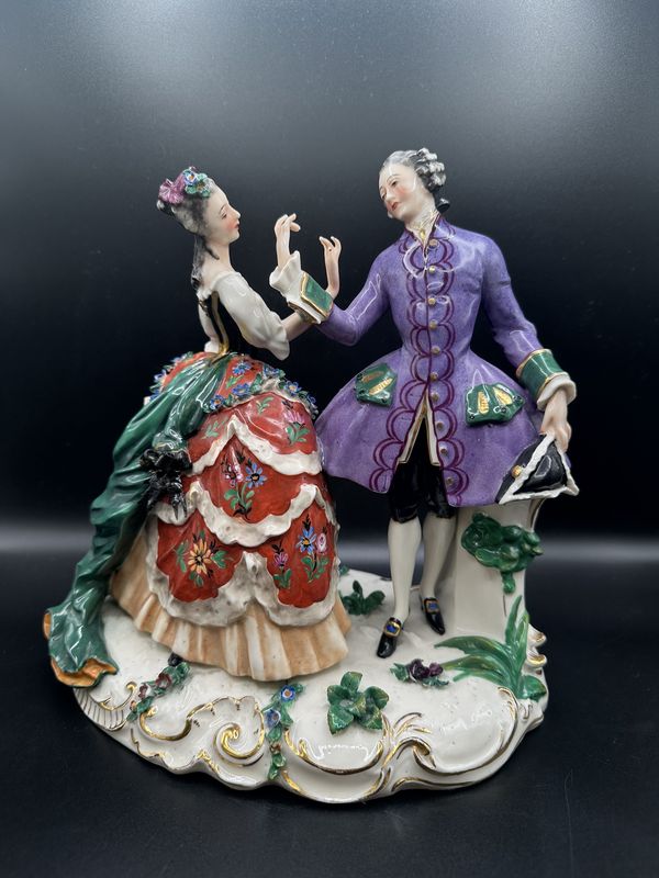 Figurine. Italy. Capodimonte. Porcelain. Colonial Couple Dancing, Wearing Red Dress &amp; Purple Coat. 9&quot;W x 9&quot;H