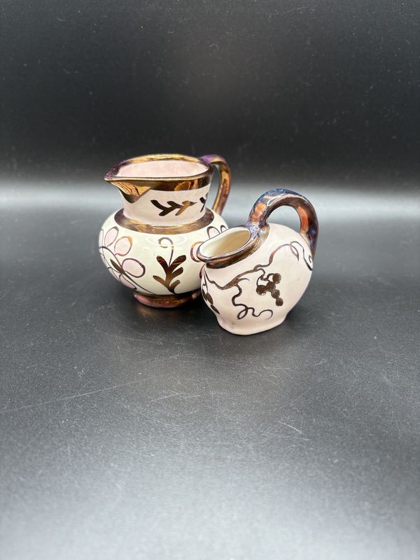 Porcelain. England. Lancasters Ltd. Pink and Copper Set of 2 Miniature Pitchers. 2.75&quot;H