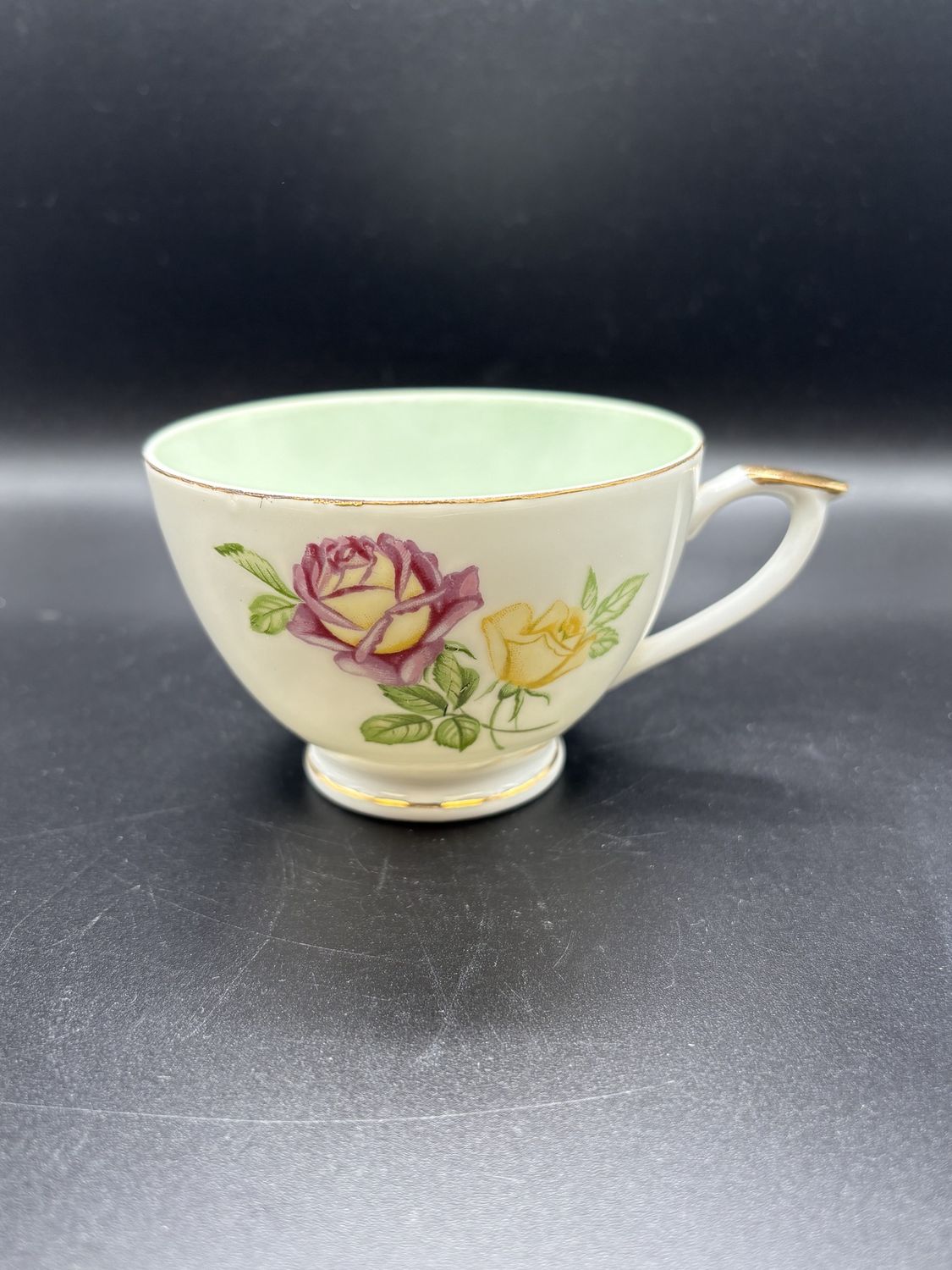Porcelain. Lefton China. Japan. Hand Painted White Teacup w/ Floral Pattern and Green Interior. 2.5&quot;H