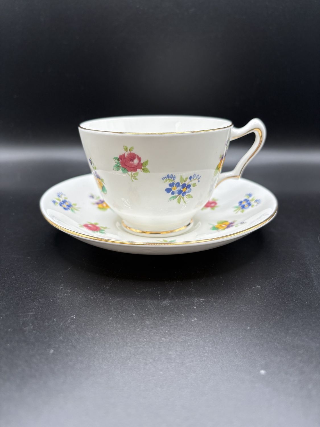 Porcelain. England. Royal Victoria. Teacup and Saucer. Fine Bone China. Floral Design. Teacup is 3&quot;H
