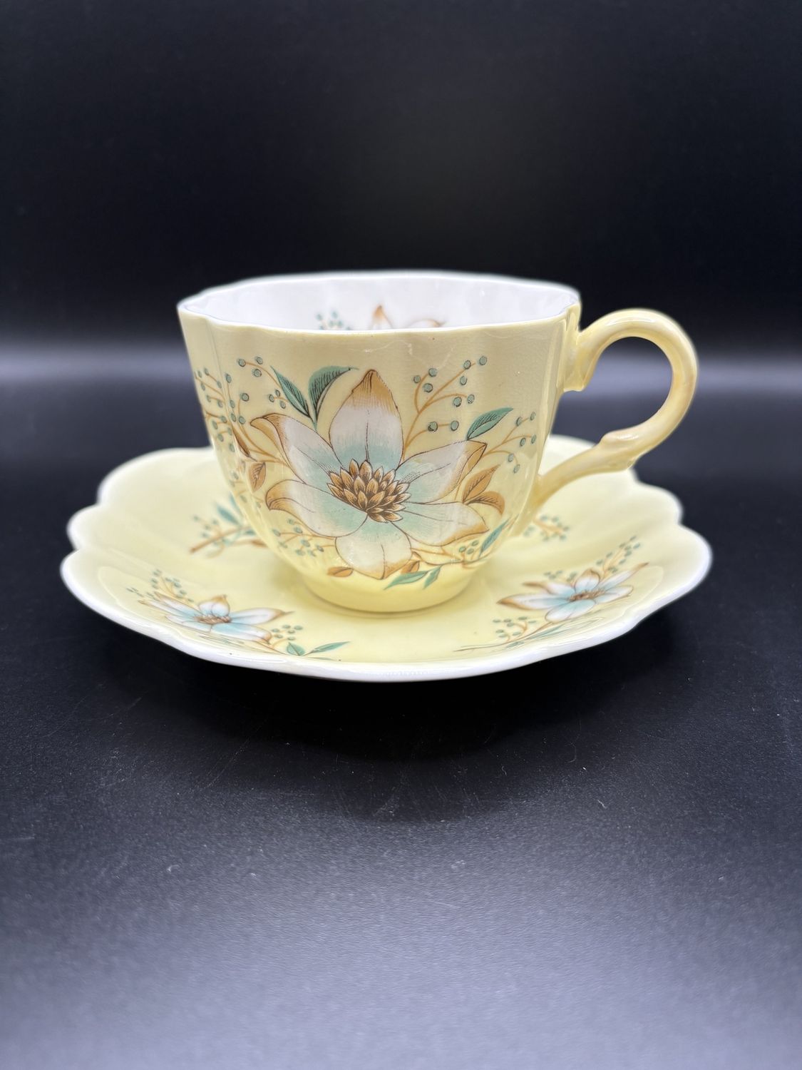 Porcelain. England. Clare. Teacup &amp; Saucer. Yellow with Florals. Cup is 2.5&quot;H