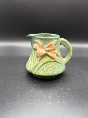 Ceramic. USA. Roseville Pottery. 7-C. Creamer. Zephyr Lily Pattern on Teal. 3"H
