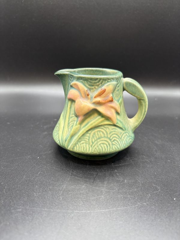 Ceramic. USA. Roseville Pottery. 7-C. Creamer. Zephyr Lily Pattern on Teal. 3&quot;H
