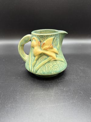 Ceramic. USA. Roseville Pottery. 7-C. Creamer. Zephyr Lily Pattern on Teal. 3"H