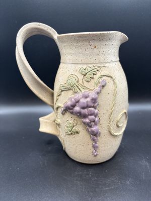 Ceramic. Handmade Speckled Pitcher w/ Grapevine Design on Sides &amp; Twisted Handle. 8"H