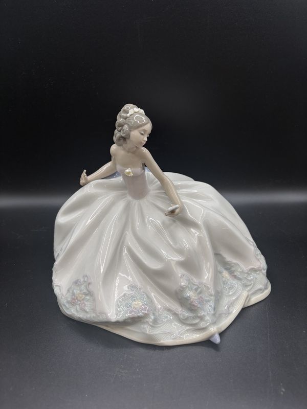 Figurine. Spain. Lladro. &quot;At the Ball&quot; Porcelain Figure. Young Lady in a Ballgown. 8.25&quot;L x  6&quot;W x 6.5&quot;H