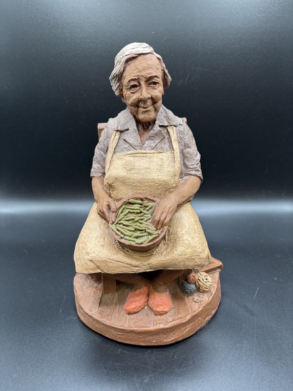 Sculpted Figure. USA. Tom Clark. #164 &quot;Nellie&quot; (Retired). Older Woman Sitting w/ Bowl of Green Beans. 1981. Signed. 9&quot;H