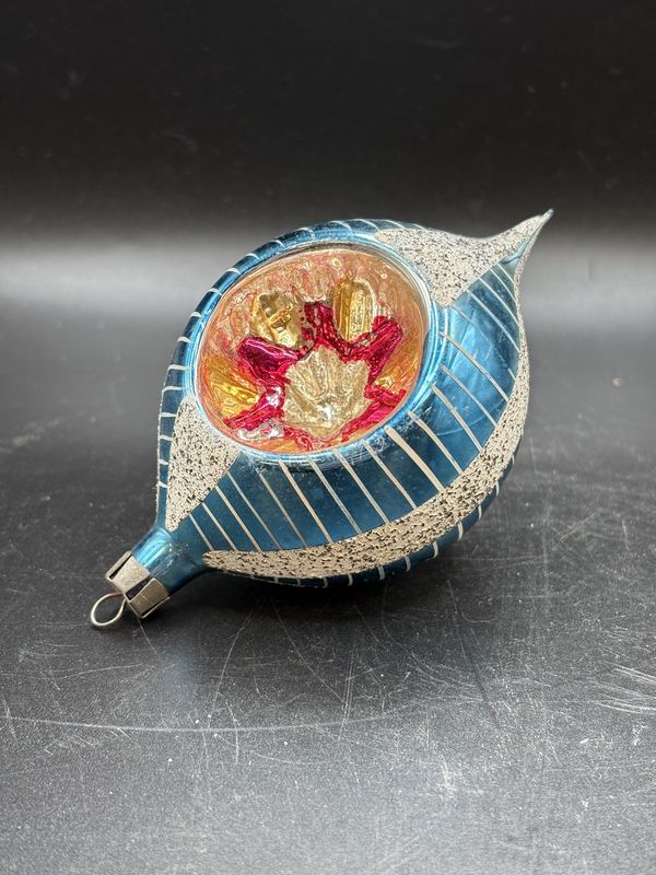 Ornament. Mercury Glass Blue and Silver Striped w/ Silver and Yellow/Pink Center.