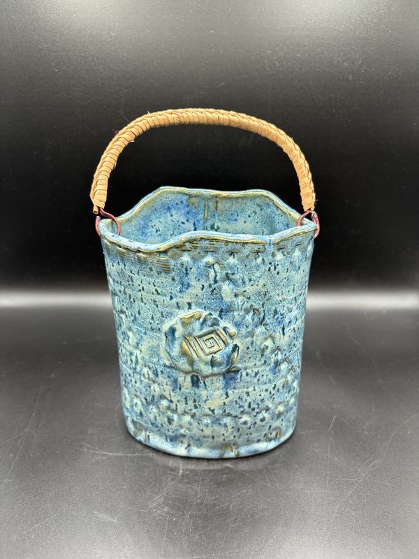 Decor. Handmade Blue Pottery Basket w/Brown Rattan Handle. 5"L x 3.25"W x 6.5"H