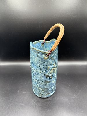 Decor. Handmade Blue Pottery Basket w/Brown Rattan Handle. 5"L x 3.25"W x 6.5"H