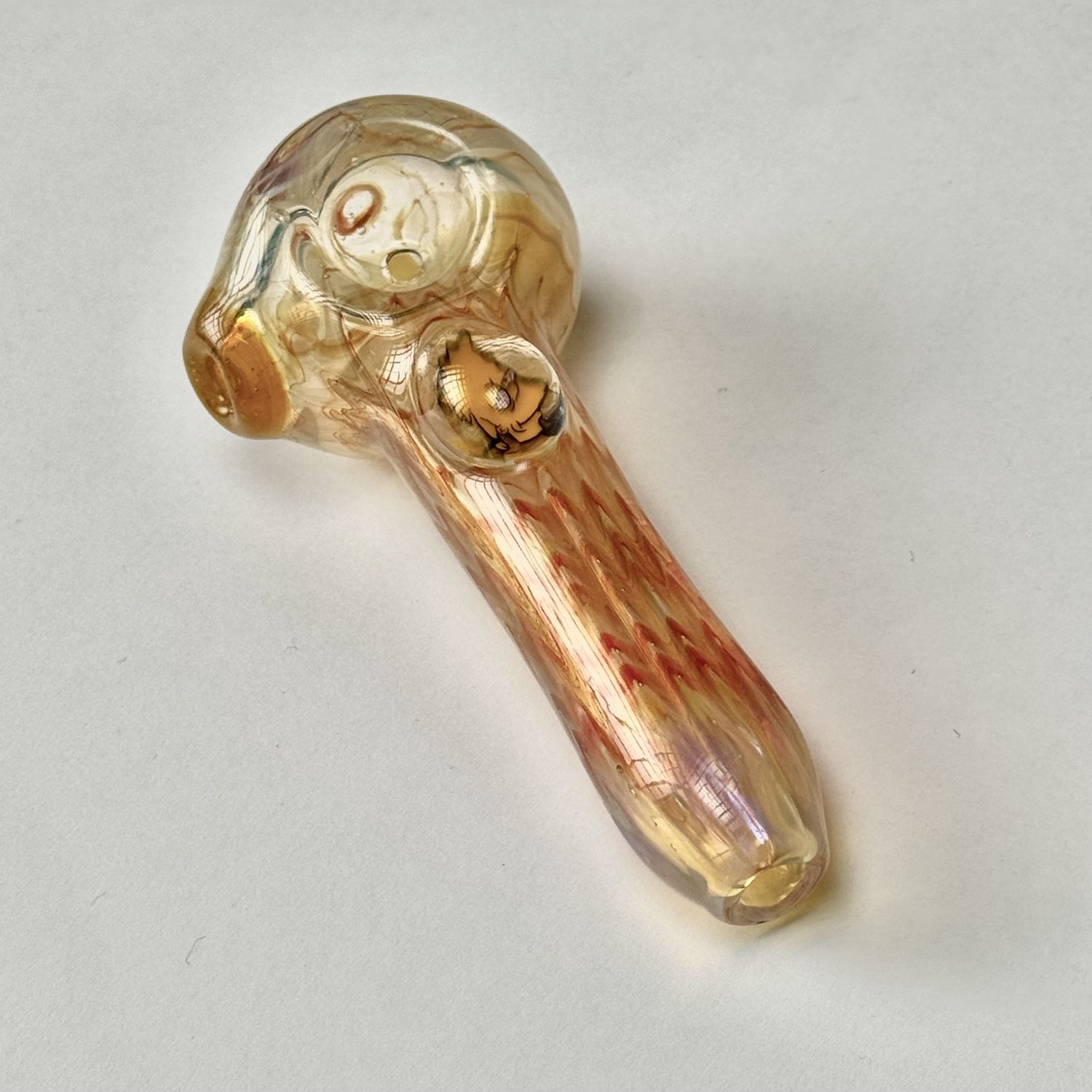 Millie Logo Spoon by Kyle Rasmussen - Yellow Man w/ Ponytail