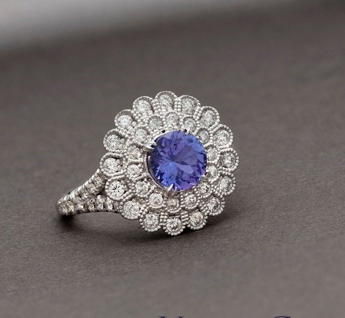 Tanzanite & diamonds in halo ring