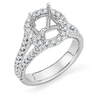 Round halo engagement ring with split shank