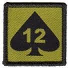 British Army 12 Mechanized Brigade - 12 On Ace Of Spades On Olive Square arm badge