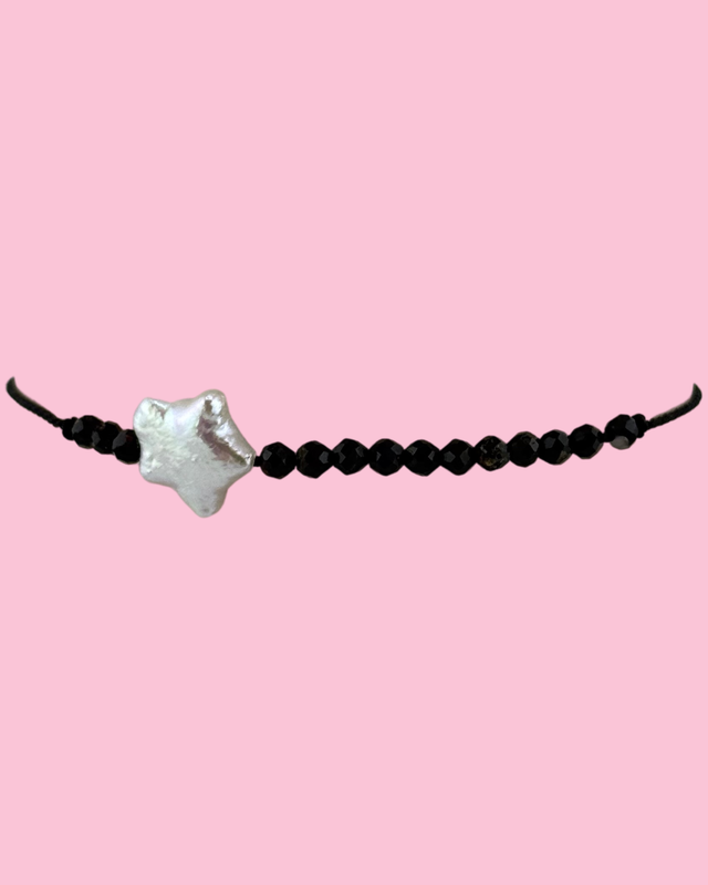 pearl and black stones