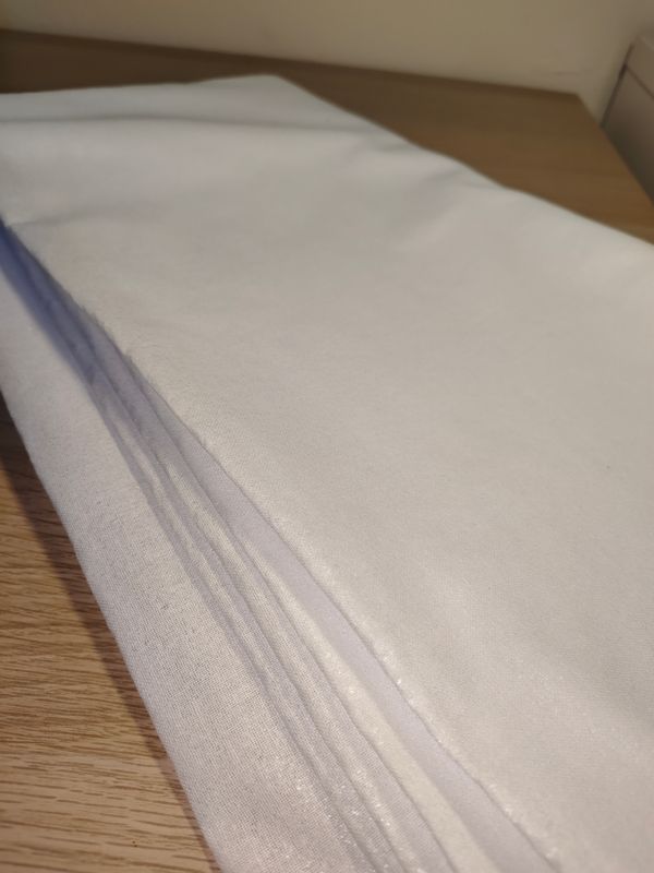 Entretela tejida blanca termoadhesiva