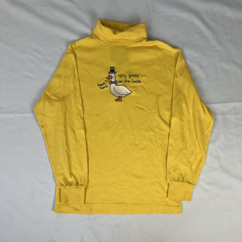 yellow silly goose turtle neck