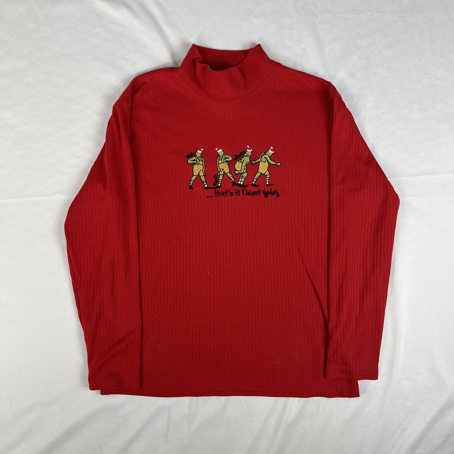 grinch red turtleneck