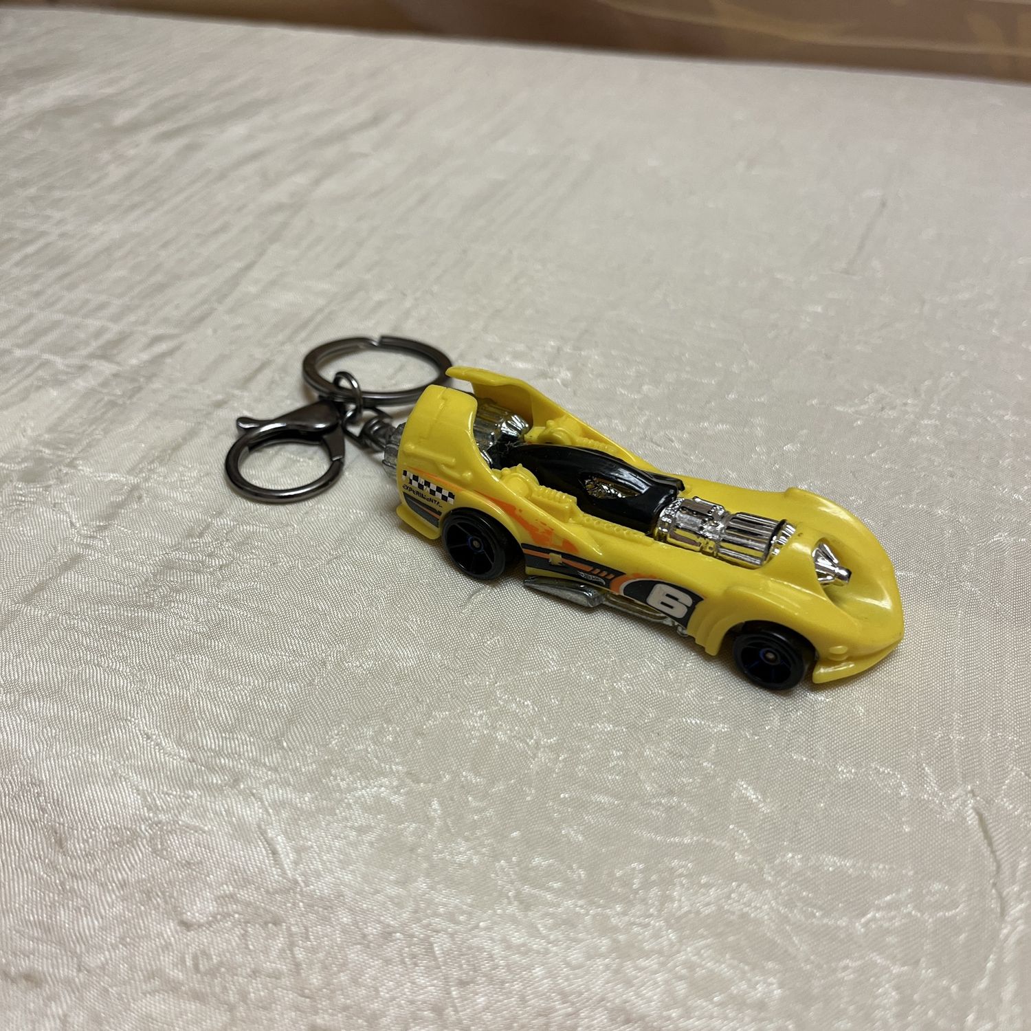 #6 yellow race car keychain