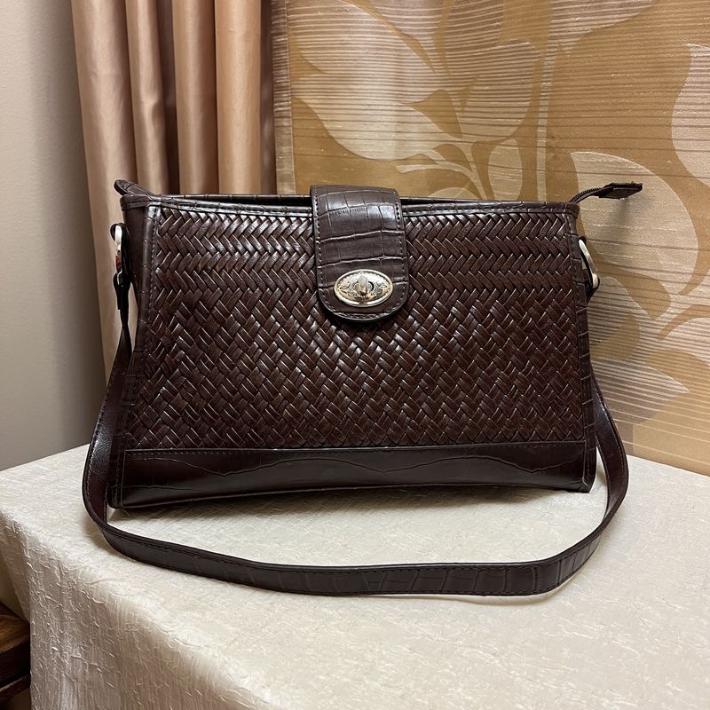 brown woven western bag