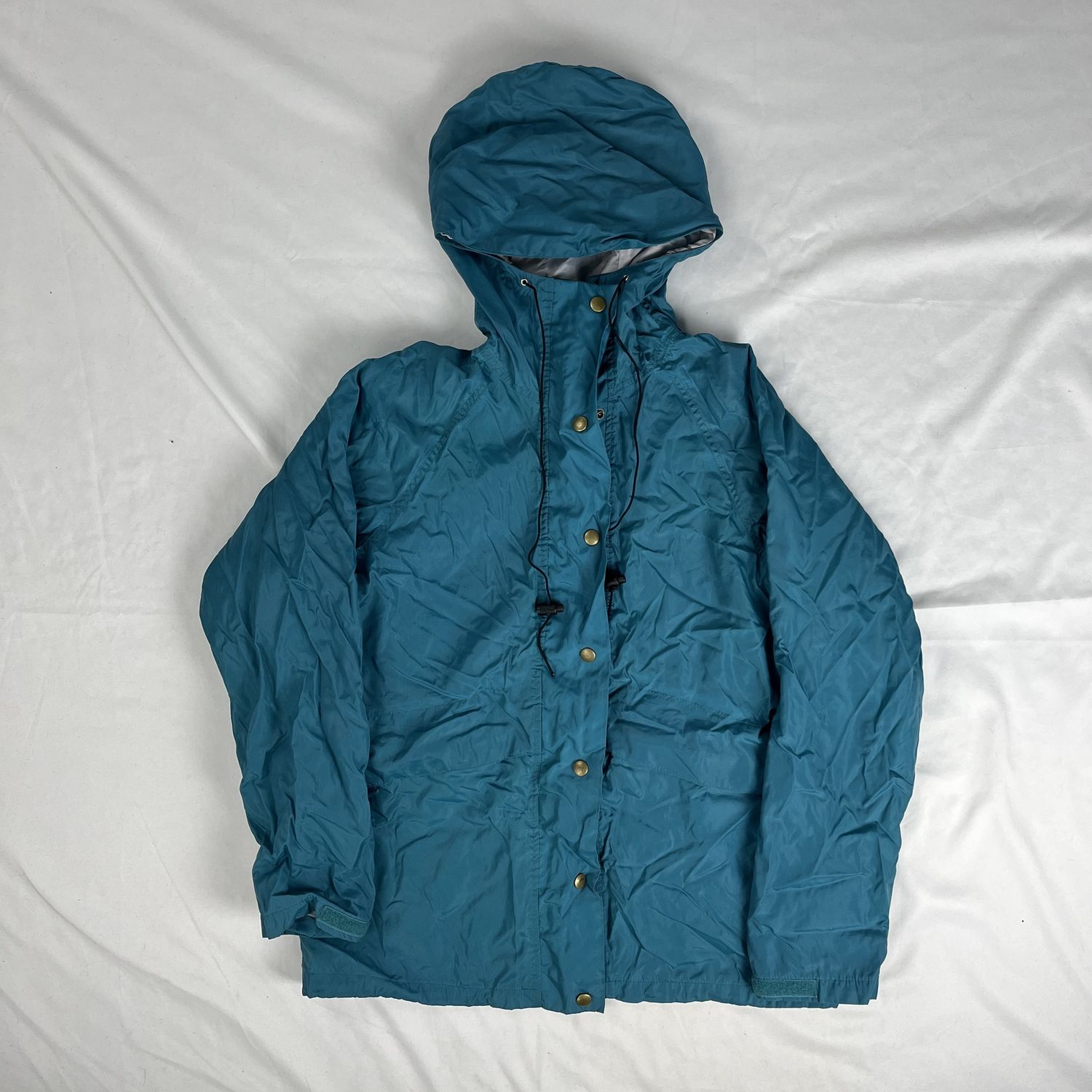 teal lined raincoat