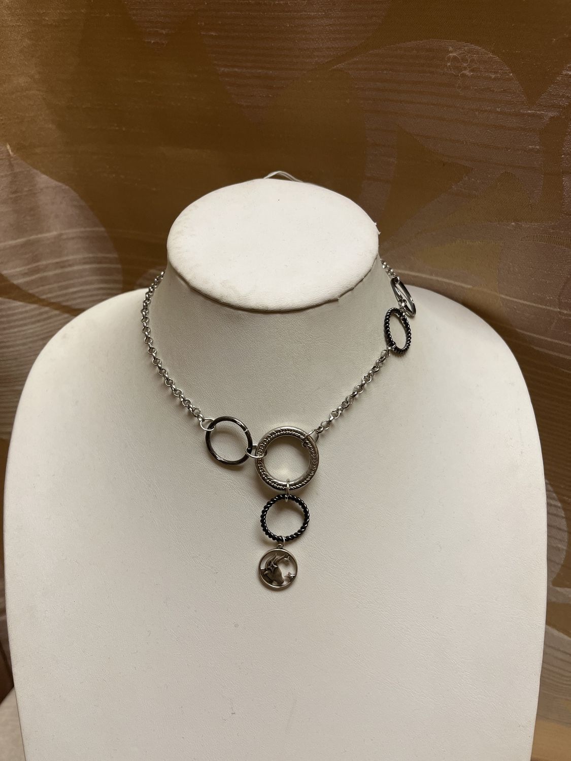 black and silver taurus necklace