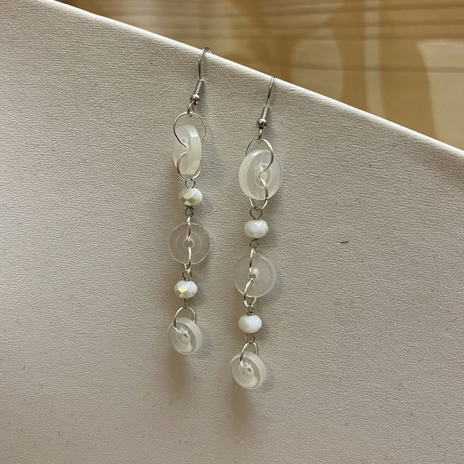 white button earrings