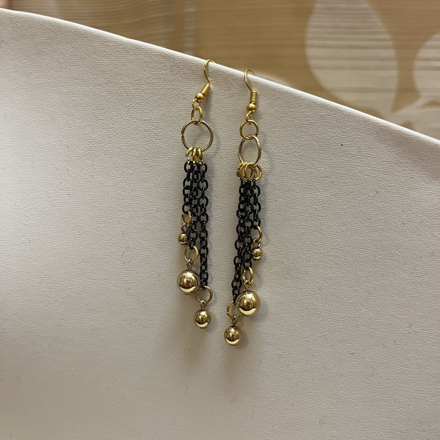 golden pearl black dangle