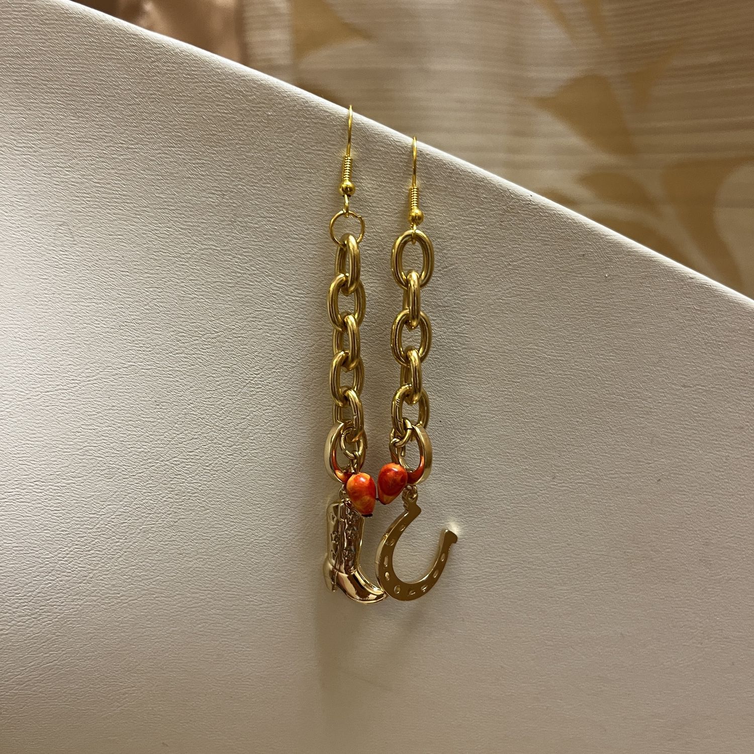 gold cowboy earrings
