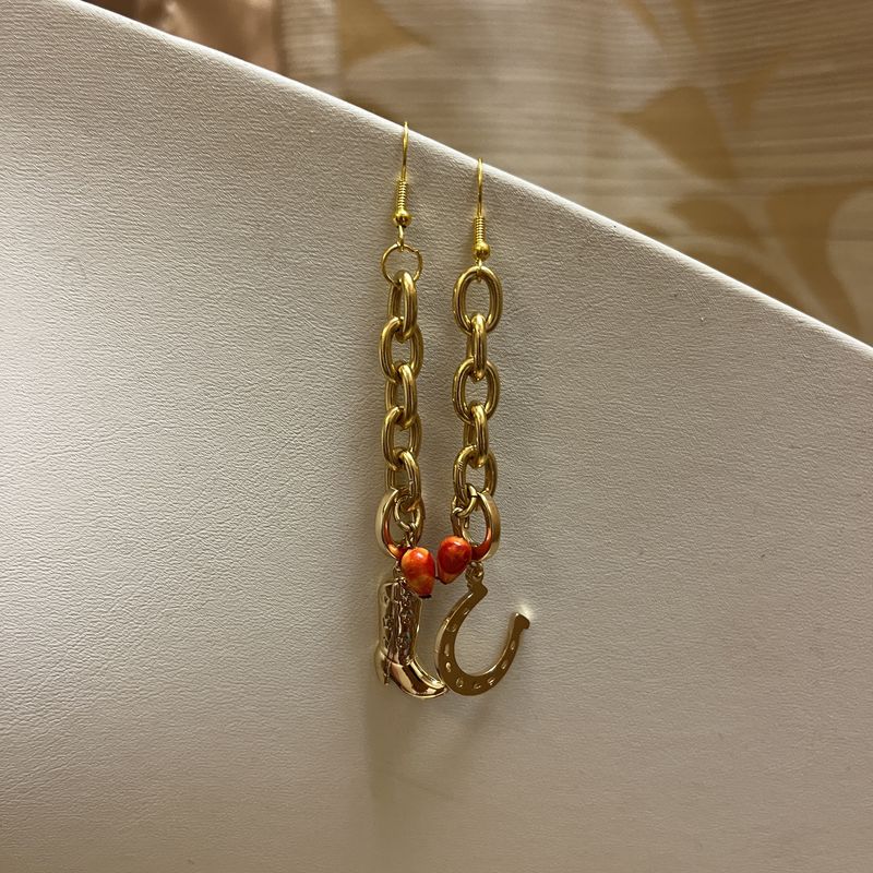 gold cowboy earrings