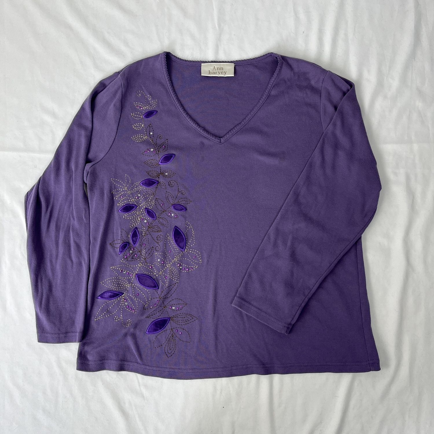 purple embroidered top