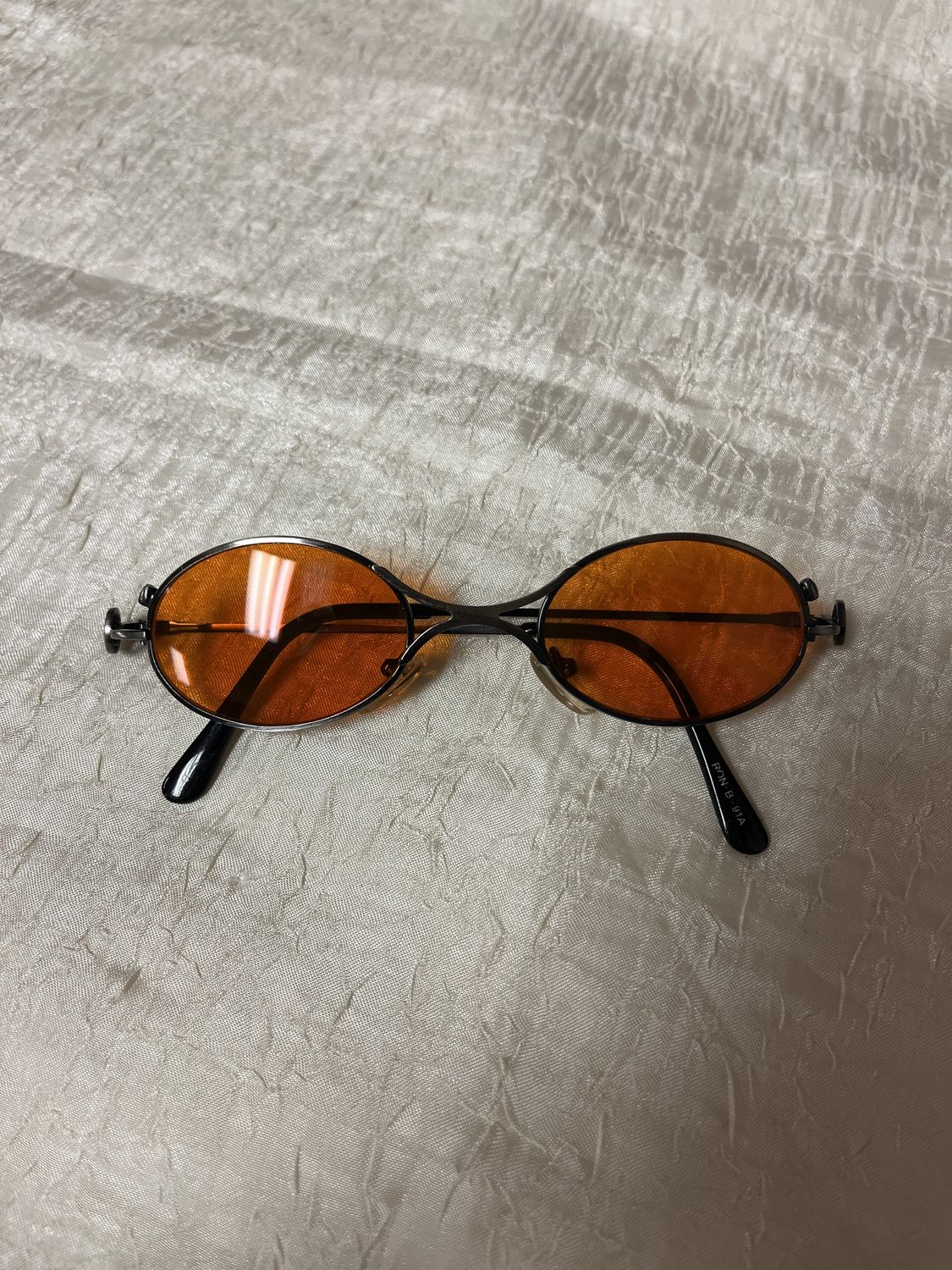 orange round sunglasses