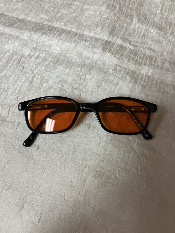 orange and black square sunglasses