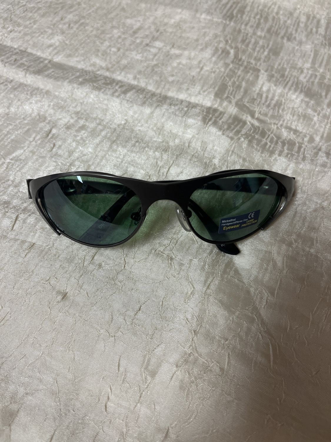 green edgy sunglasses