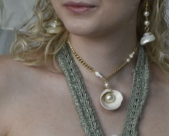 Shell Enclosed Pearl Necklace
