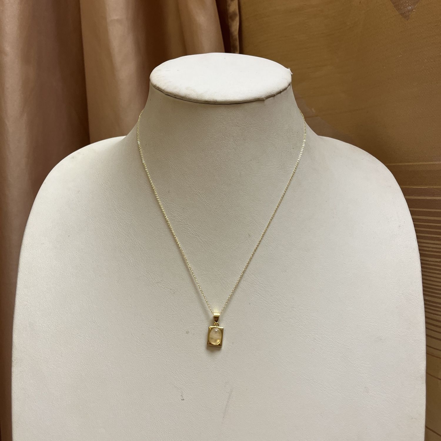 Delicate Gold Pendant with Tan Stone