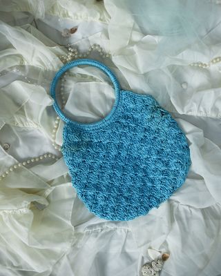 blue woven beaded bag