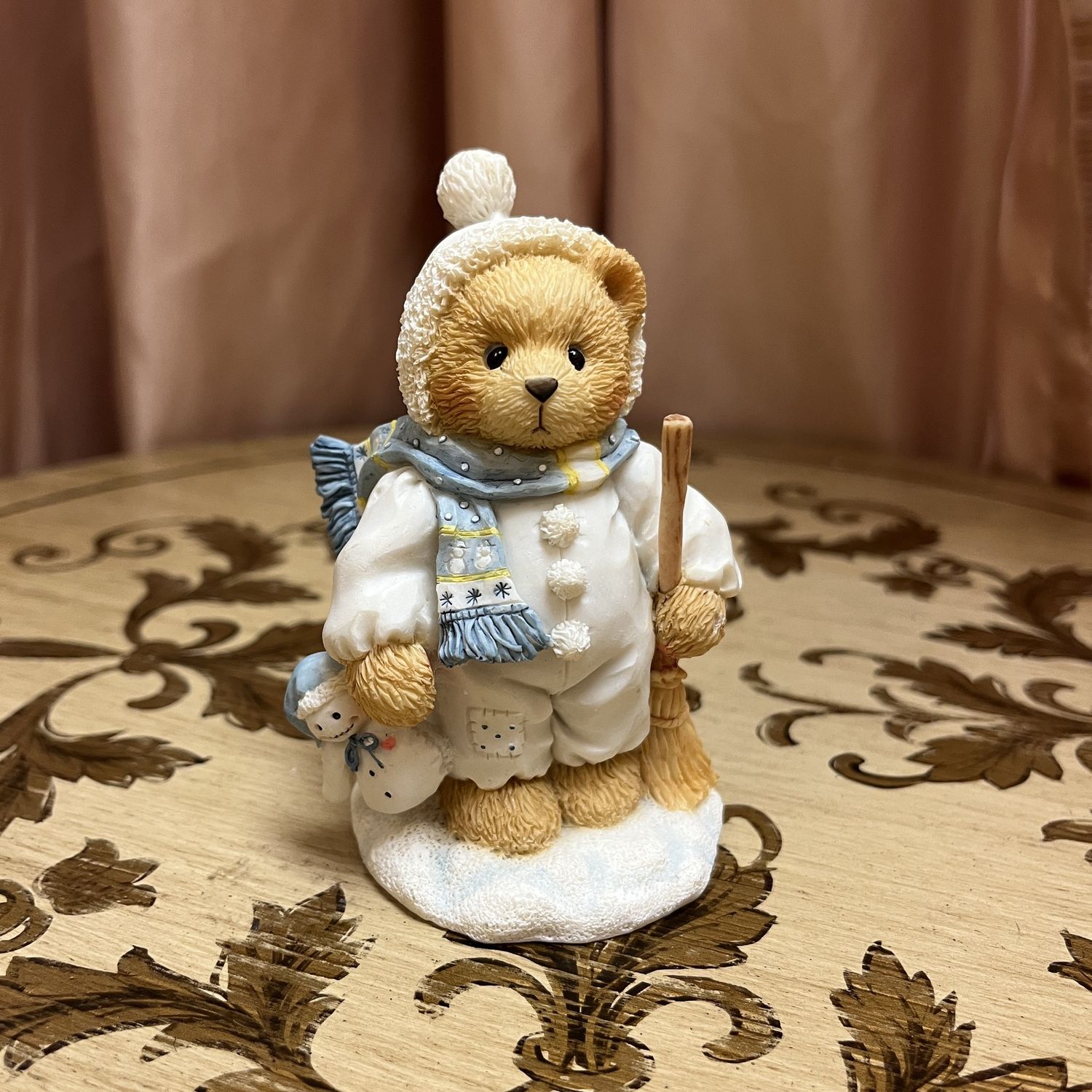 Snowy teddy bear figurine