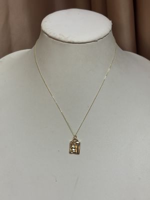 gold face necklace