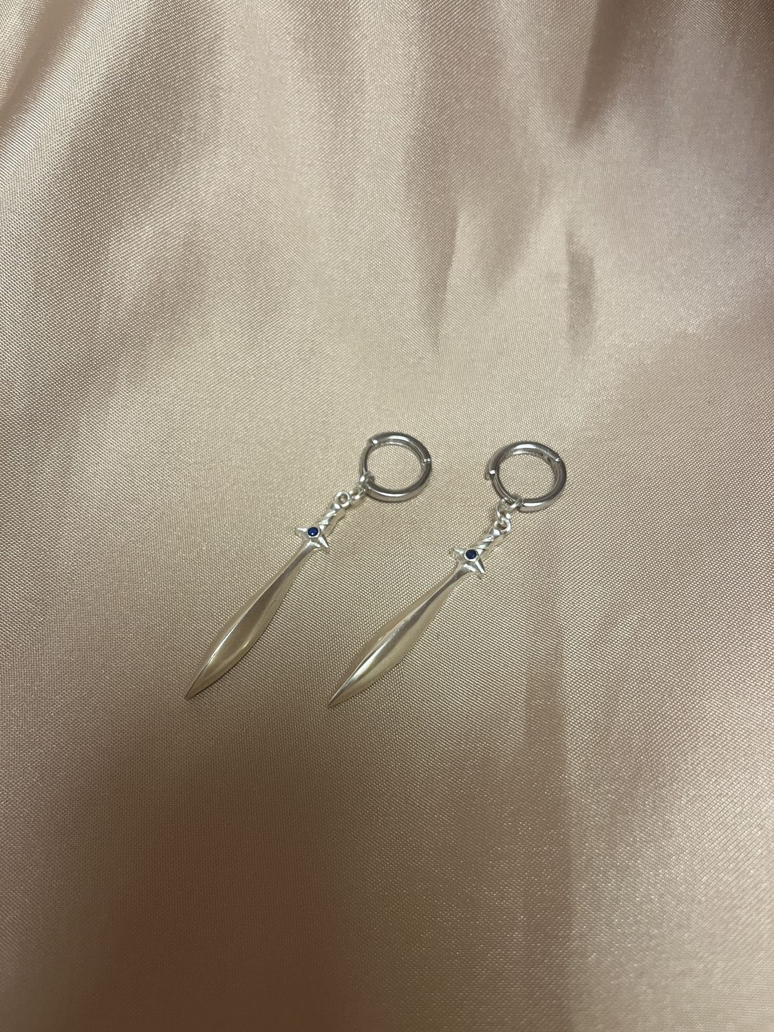 silver hoop sword earrings