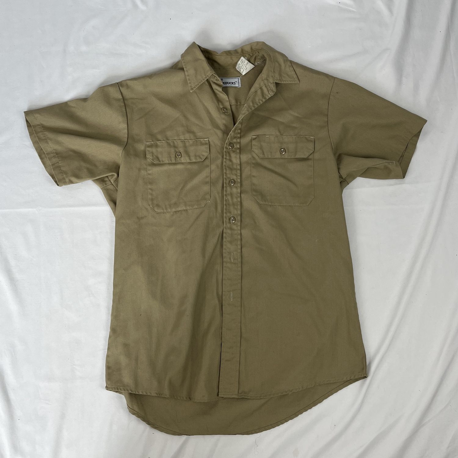 tan work shirt