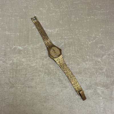 Gold octagon watch